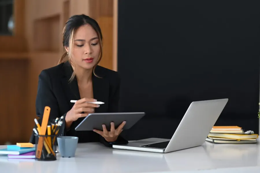 TBS advisor reviewing a return on a tablet